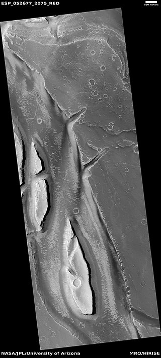 Streamlined shapes, as seen by HiRISE under HiWish program These were probably shaped by running water.