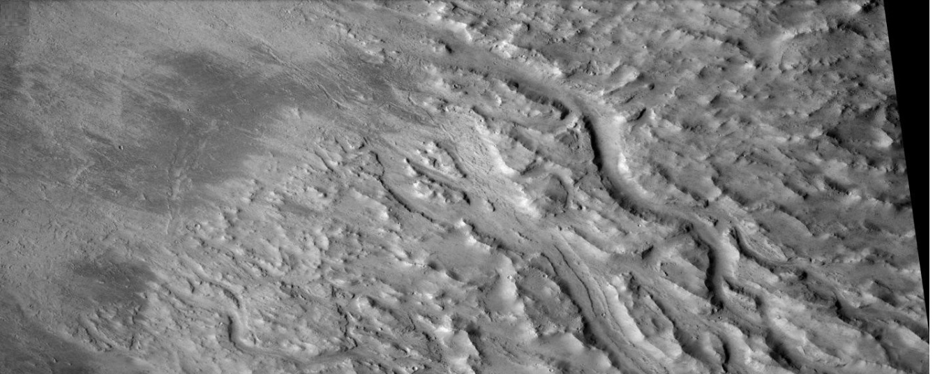 Flows and channels at the northwest margin of the Lycus Sulci, as seen by CTX