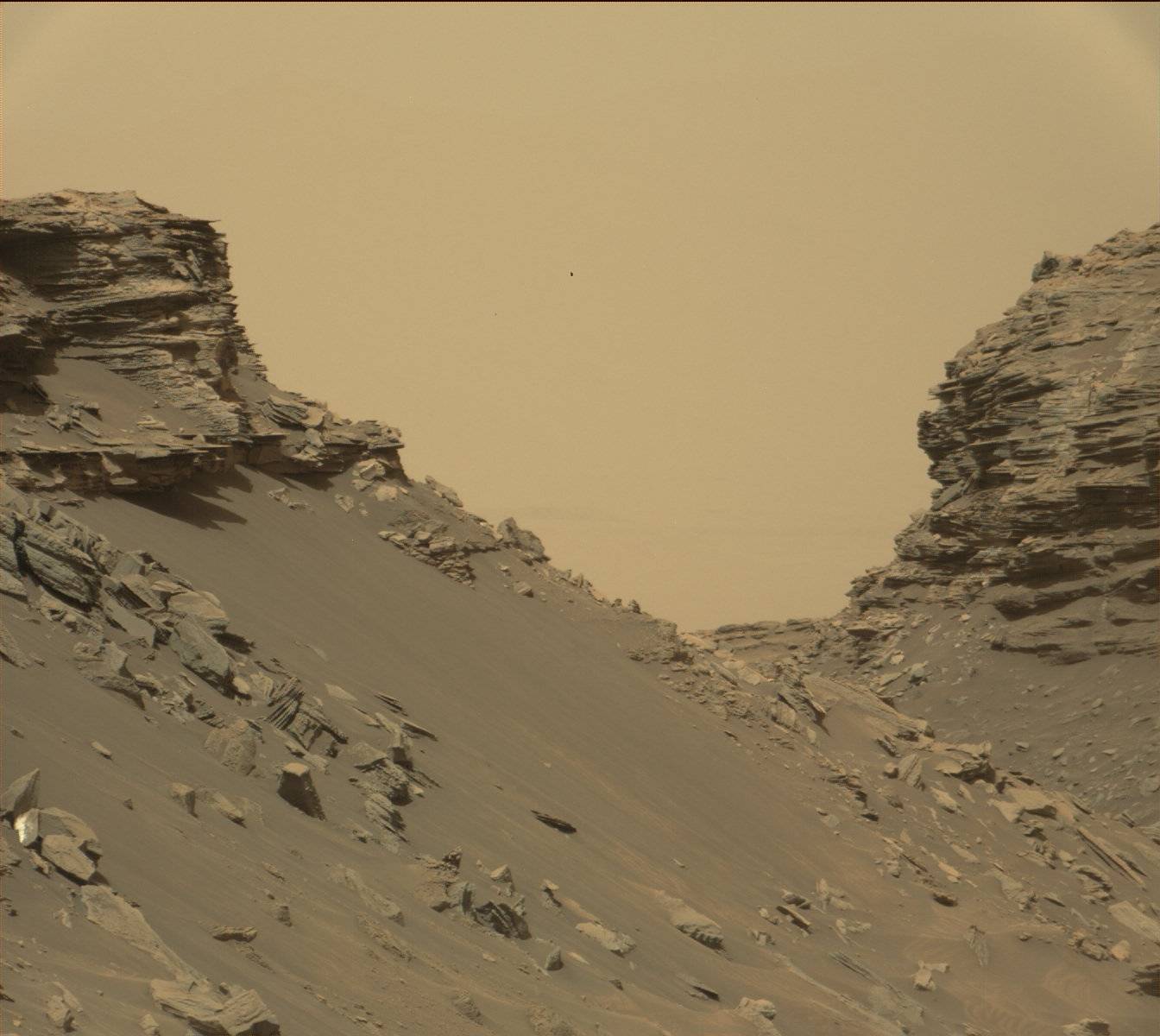 View from Mastcam on Curiosity showing sloping buttes and layered outcrops on lower Mount Sharp